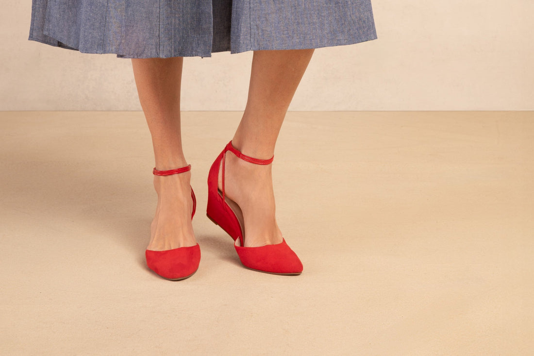 Landmark Lava red suede wedges worn with a chambray midi skirt