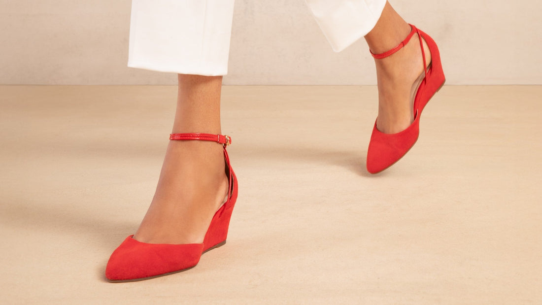 Landmark Lava red suede wedges worn with white cropped trousers