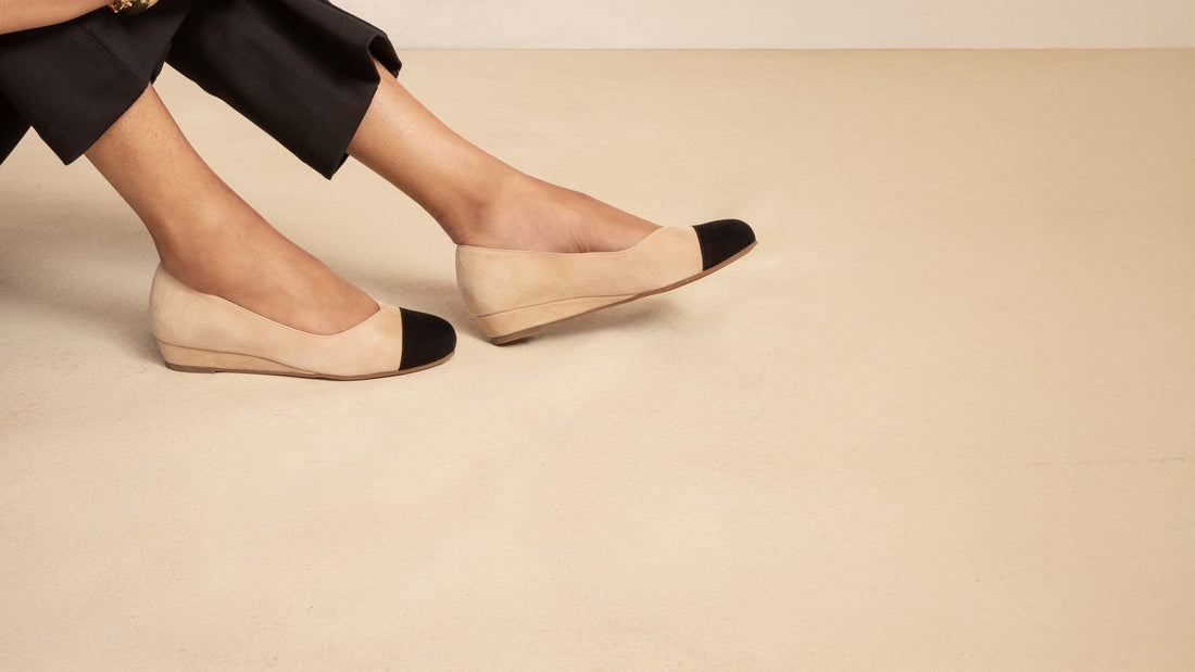 Journey Sand cap-toe flats worn with black cropped trousers