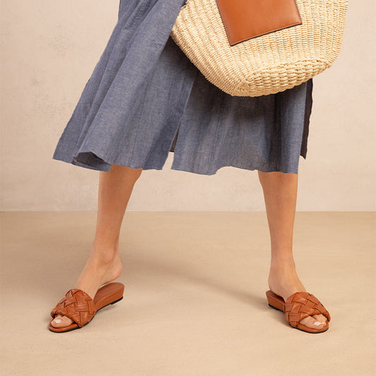 Steffie's Glide Saddle saddle-brown woven leather slide sandal with RoamFoam cushioning